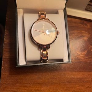 INC Watch.   Rose gold color